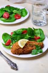 Baked in Bread Crumbs Chicken Breast with Spinach Salad 