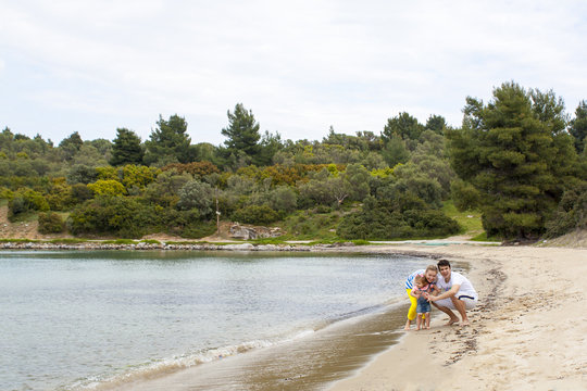 Happy family on the beach.