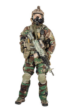 soldier or private military contractor with rifle and gas mask. war, army, weapon, technology and people concept. Image on a white background.