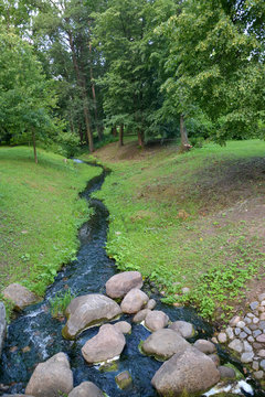 Stream with boulders in park