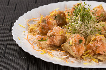 Salmon sashimi with Japanese mayonese served as an apetizer