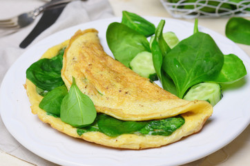 Omelette with spinach and cheese