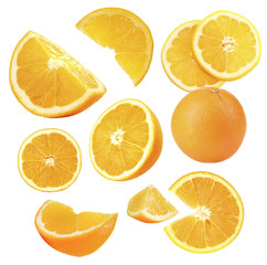 Fototapeta premium Falling ripe oranges isolated on white