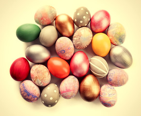 Easter eggs heap on table.Retro stylization