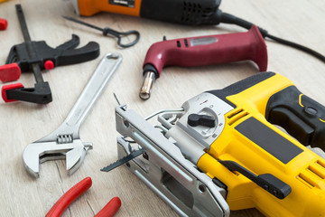 Assorted work tools on wood