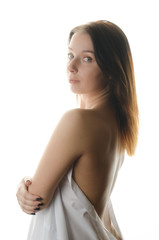 Obraz premium Beautiful young woman with fresh healthy skin. Beautiful young woman with cream on her shoulder 