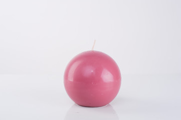 pink purple circle candle on white screen