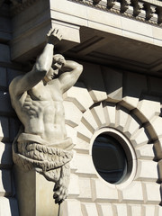 Figure atlas, supporting  balcony of  building