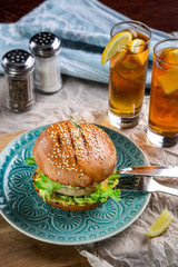 Sandwich with chicken burger, cheese and lettuce