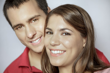 Woman and man snuggling portrait