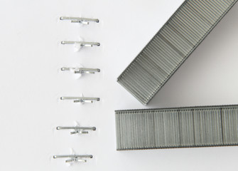 Staples in a stapled papers, macro view