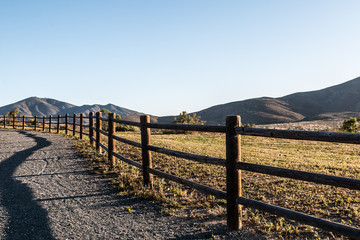 Fototapeta na wymiar Path towards mountain range at Mountain Hawk Park in Chula Vista, California. 