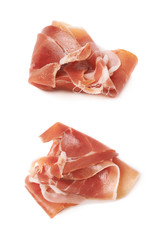 Folded prosciutto ham slice isolated