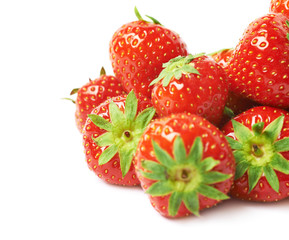 Pile of multiple strawberries isolated