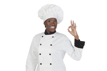 female chef with ok gesture