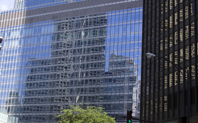 Fototapeta na wymiar building reflected on building