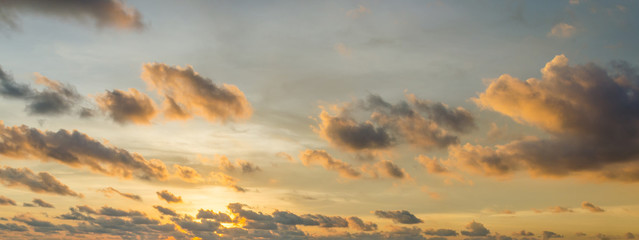 Sunset behind the cloud and orange sky