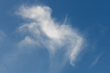 Blue sky with white fluffy cloud background