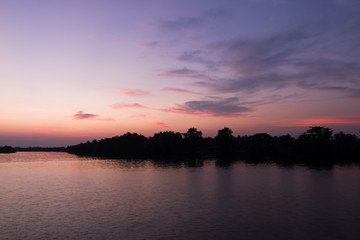 Fototapeta na wymiar Beautiful sky sunset at Tapee river Suratthani Thailand