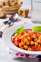 Chickpeas cooked with  sauce