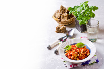 Chickpeas cooked with  sauce