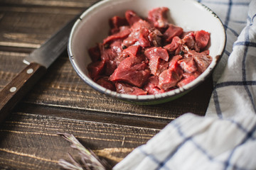 minced meat on wooden table