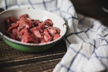 minced meat on wooden table