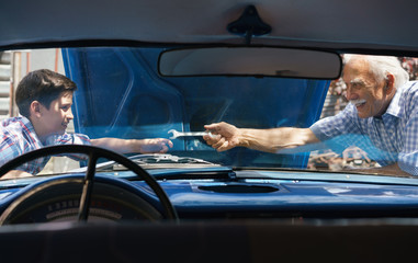 Old Man Grandpa Fixing Car Engine With Boy