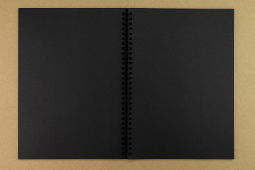 black paper notebook