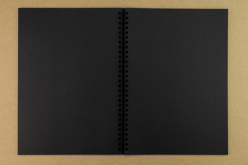black paper notebook