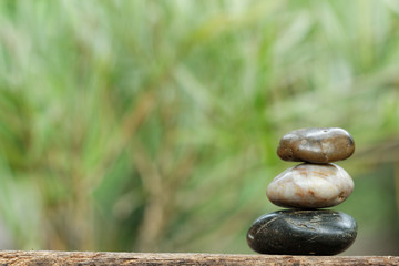 Tower stone with bamboo in the background. Concept of tranquility,peace and relaxing.