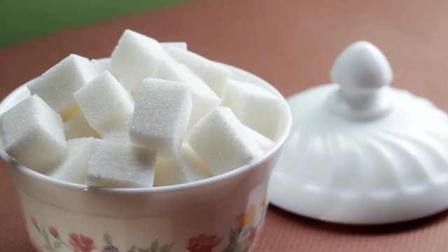 Pieces of refined sugar in the sugar bowl