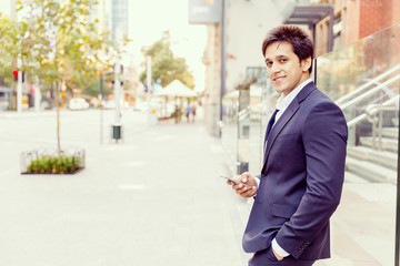 Portrait of confident businessman outdoors