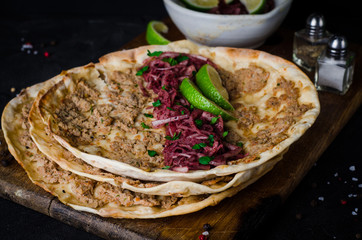 Lahmacun - turkish or arabian pizza with miced meat and spice