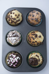 Chocolate Muffins with Sugar Icing. Isolated with clipping path.