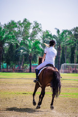 women horse riding