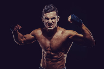 Obraz na płótnie Canvas MMA Fighter Preparing Bandages For Training