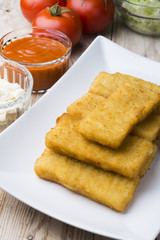 Meat croquettes served with fresh vegetables.