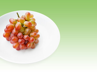 fresh grape fruit on white dish in green background thailand 1