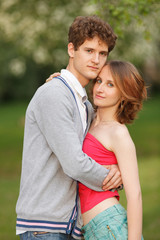 Fototapeta premium Young couple having fun in the park
