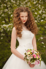 Fototapeta na wymiar Young bride with flowers