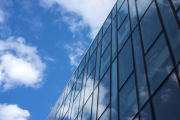 Fototapeta na wymiar Glass facade of office building