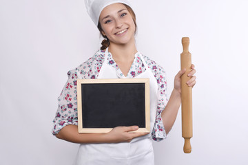 young woman chef with blackboard.