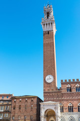 Fototapeta premium Piazza del Campo at sunset with Palazzo Pubblico, Siena, Italy