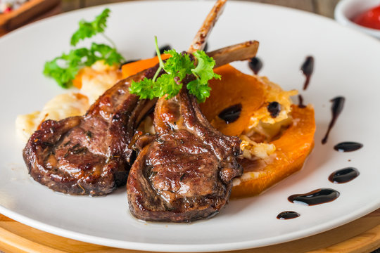 Roasted lamb ribs with  grilled pumpkin
