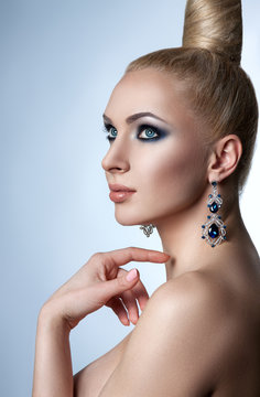 portrait of a beautiful young woman. Blonde girl with a professional make-up.