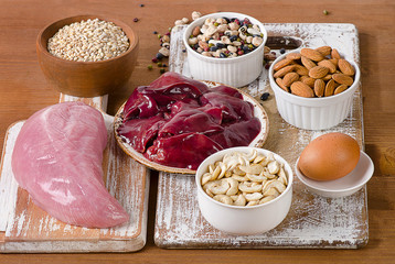 Foods with Selenium  on a rustic wooden board