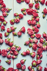 Roses on wooden background