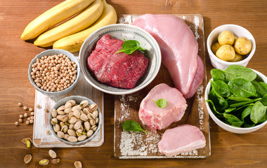 Foods Highest in Vitamin B6 on a wooden background.