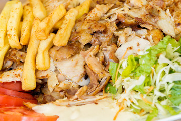 Greek gyros, meat, fried potatoes, tomatoes and onions, Athens Greece, national food, traditional Greek cuisine